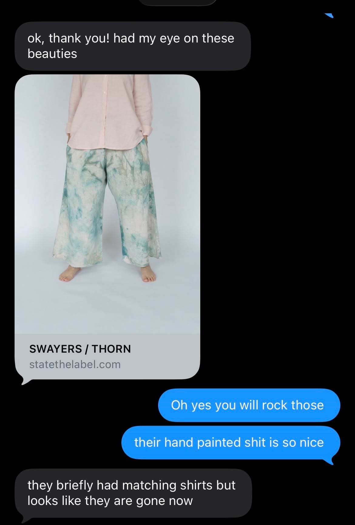 A screenshot on a black screen of a text exchange between Angela and Manjula discussing the Swayers pants.
